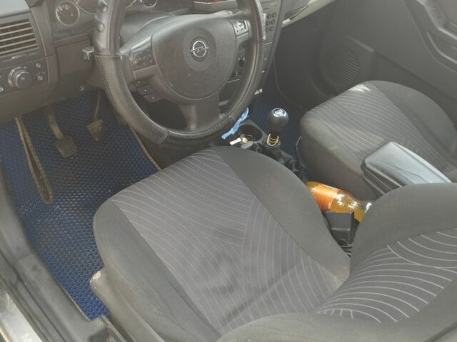 Черный Опель Мерива, объемом двигателя 1.4 л и пробегом 270 тыс. км за 4100 $, фото 7 на Automoto.ua