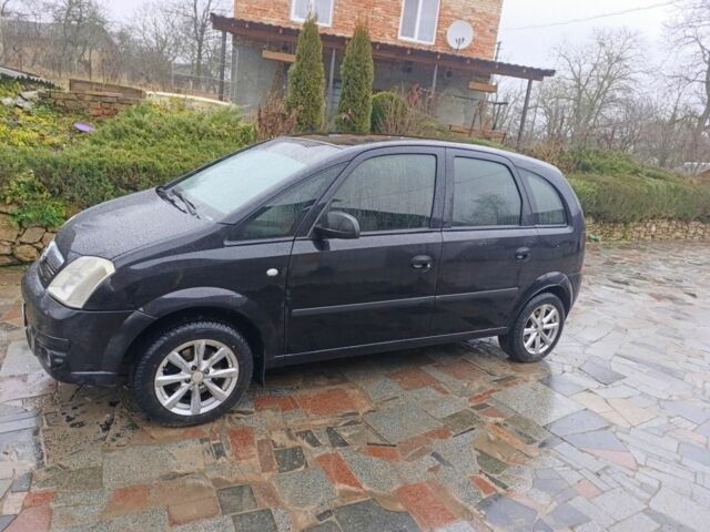 Черный Опель Мерива, объемом двигателя 1.6 л и пробегом 204 тыс. км за 3800 $, фото 1 на Automoto.ua