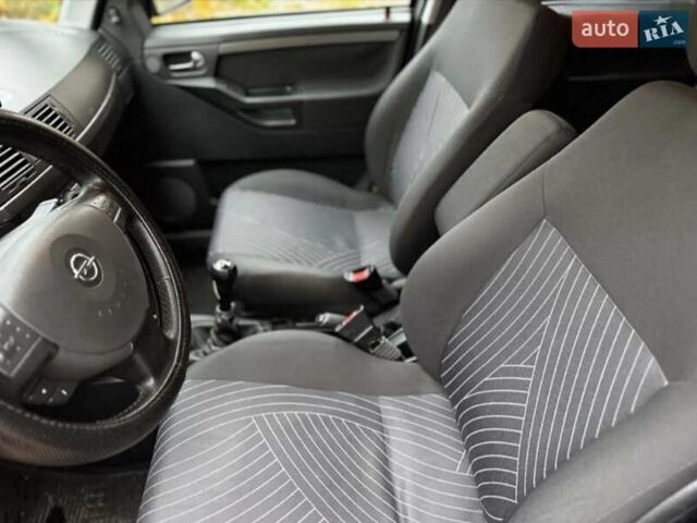 Черный Опель Мерива, объемом двигателя 1.6 л и пробегом 262 тыс. км за 4100 $, фото 20 на Automoto.ua