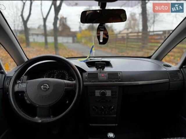 Черный Опель Мерива, объемом двигателя 1.6 л и пробегом 262 тыс. км за 4100 $, фото 11 на Automoto.ua