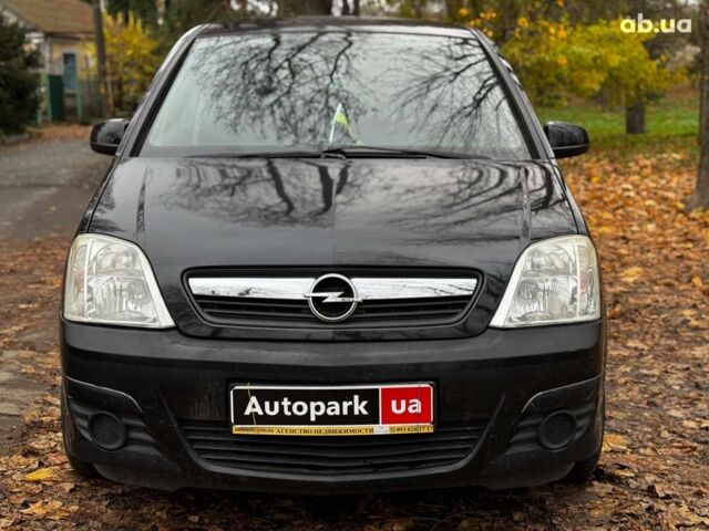 Черный Опель Мерива, объемом двигателя 1.6 л и пробегом 262 тыс. км за 4740 $, фото 2 на Automoto.ua