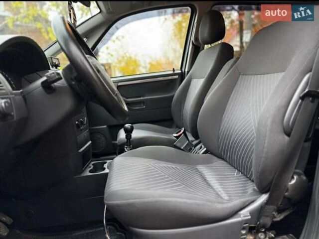 Черный Опель Мерива, объемом двигателя 1.6 л и пробегом 262 тыс. км за 4100 $, фото 19 на Automoto.ua