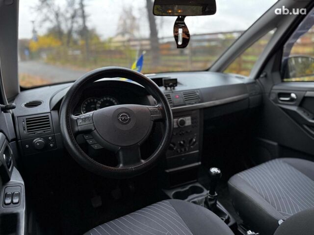 Черный Опель Мерива, объемом двигателя 1.6 л и пробегом 262 тыс. км за 4740 $, фото 20 на Automoto.ua