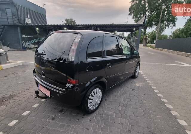 Черный Опель Мерива, объемом двигателя 1.6 л и пробегом 212 тыс. км за 4900 $, фото 6 на Automoto.ua