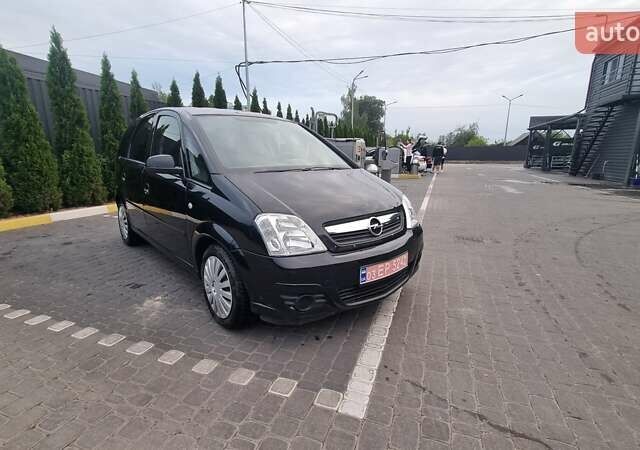 Черный Опель Мерива, объемом двигателя 1.6 л и пробегом 212 тыс. км за 4900 $, фото 9 на Automoto.ua