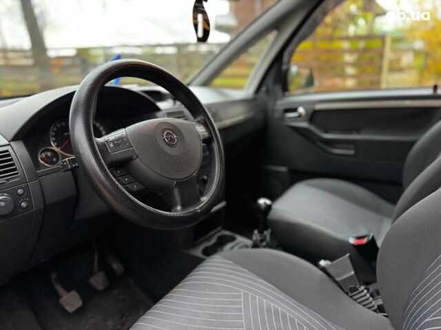 Черный Опель Мерива, объемом двигателя 1.6 л и пробегом 262 тыс. км за 4740 $, фото 23 на Automoto.ua