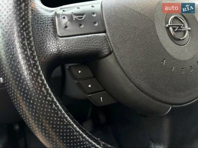 Черный Опель Мерива, объемом двигателя 1.6 л и пробегом 262 тыс. км за 4100 $, фото 15 на Automoto.ua