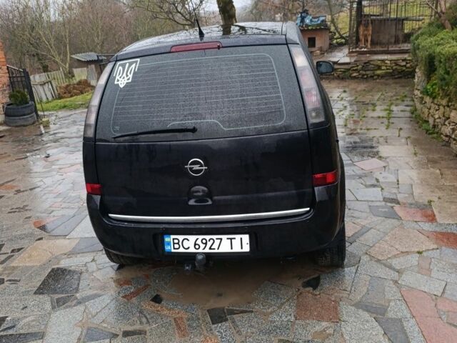 Черный Опель Мерива, объемом двигателя 1.6 л и пробегом 204 тыс. км за 3800 $, фото 2 на Automoto.ua