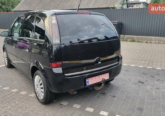 Черный Опель Мерива, объемом двигателя 1.6 л и пробегом 212 тыс. км за 4900 $, фото 5 на Automoto.ua