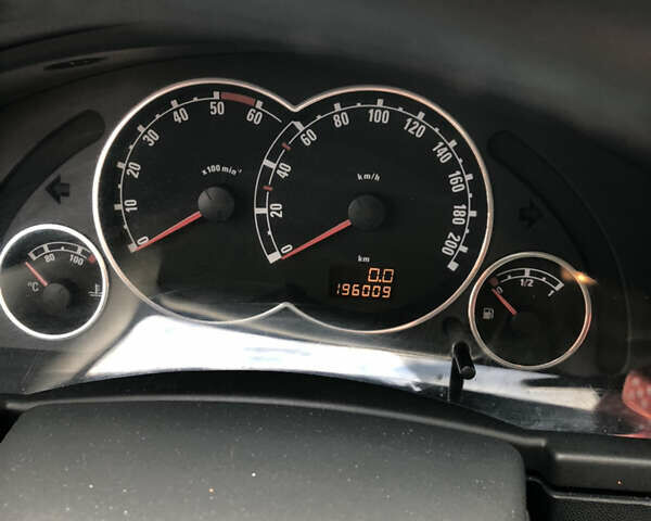 Черный Опель Мерива, объемом двигателя 1.25 л и пробегом 197 тыс. км за 3650 $, фото 9 на Automoto.ua