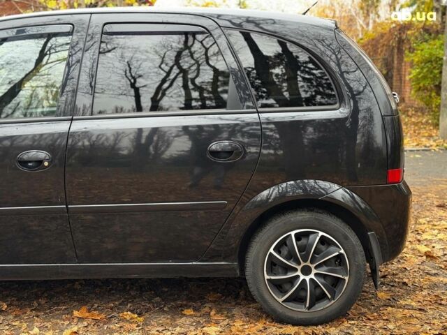 Черный Опель Мерива, объемом двигателя 1.6 л и пробегом 262 тыс. км за 4740 $, фото 13 на Automoto.ua