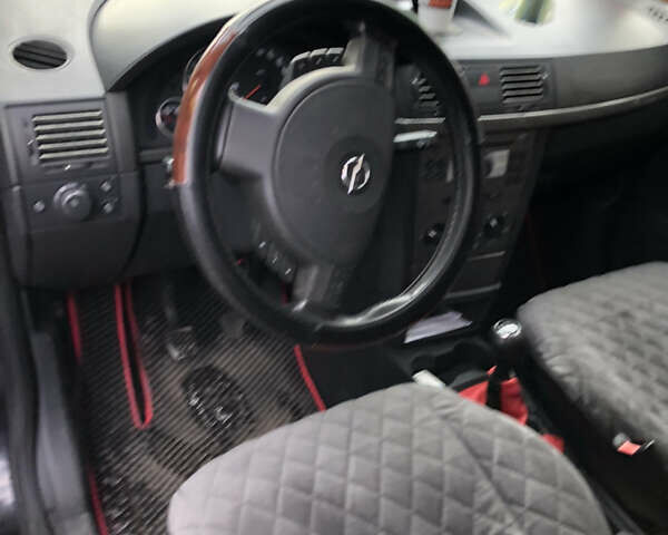 Черный Опель Мерива, объемом двигателя 1.25 л и пробегом 197 тыс. км за 3650 $, фото 8 на Automoto.ua