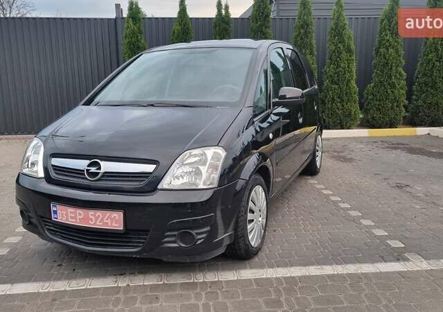 Черный Опель Мерива, объемом двигателя 1.6 л и пробегом 212 тыс. км за 4900 $, фото 1 на Automoto.ua