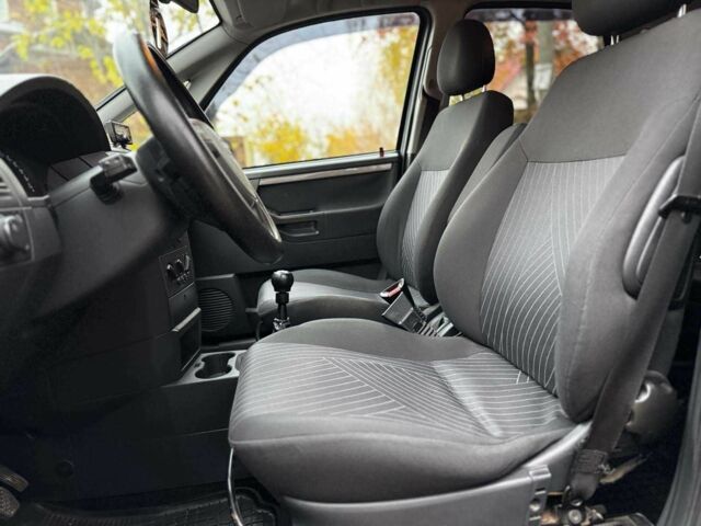 Черный Опель Мерива, объемом двигателя 1.6 л и пробегом 262 тыс. км за 4740 $, фото 22 на Automoto.ua