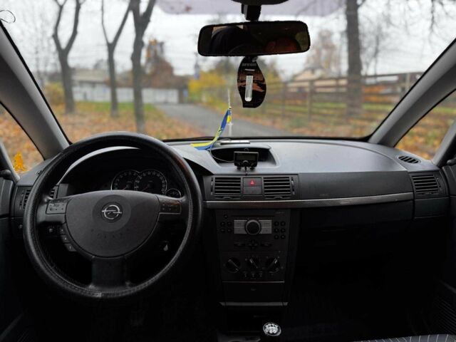 Черный Опель Мерива, объемом двигателя 1.6 л и пробегом 262 тыс. км за 4740 $, фото 19 на Automoto.ua