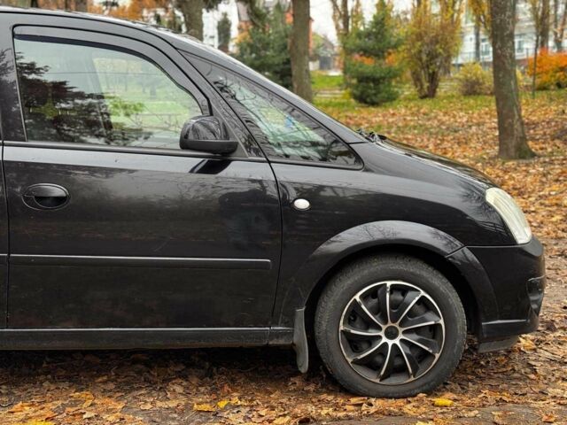 Черный Опель Мерива, объемом двигателя 1.6 л и пробегом 262 тыс. км за 4740 $, фото 5 на Automoto.ua