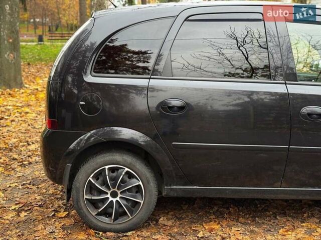 Черный Опель Мерива, объемом двигателя 1.6 л и пробегом 262 тыс. км за 4740 $, фото 7 на Automoto.ua