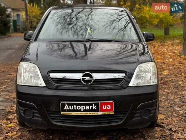 Черный Опель Мерива, объемом двигателя 1.6 л и пробегом 262 тыс. км за 4740 $, фото 2 на Automoto.ua