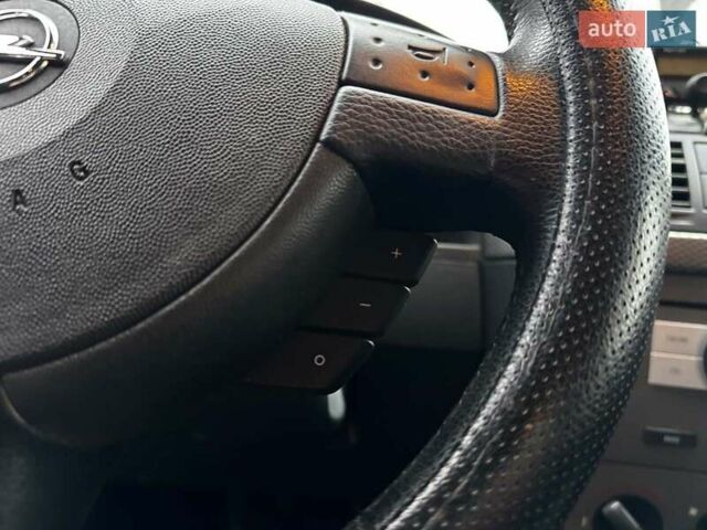 Черный Опель Мерива, объемом двигателя 1.6 л и пробегом 262 тыс. км за 4740 $, фото 26 на Automoto.ua