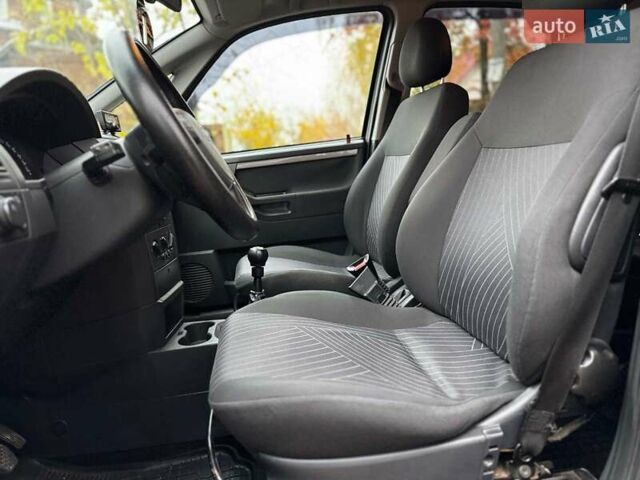 Черный Опель Мерива, объемом двигателя 1.6 л и пробегом 262 тыс. км за 4740 $, фото 22 на Automoto.ua