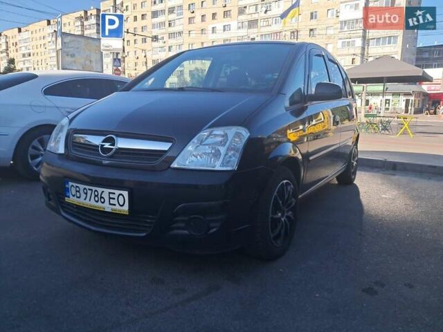 Черный Опель Мерива, объемом двигателя 1.6 л и пробегом 262 тыс. км за 4100 $, фото 2 на Automoto.ua