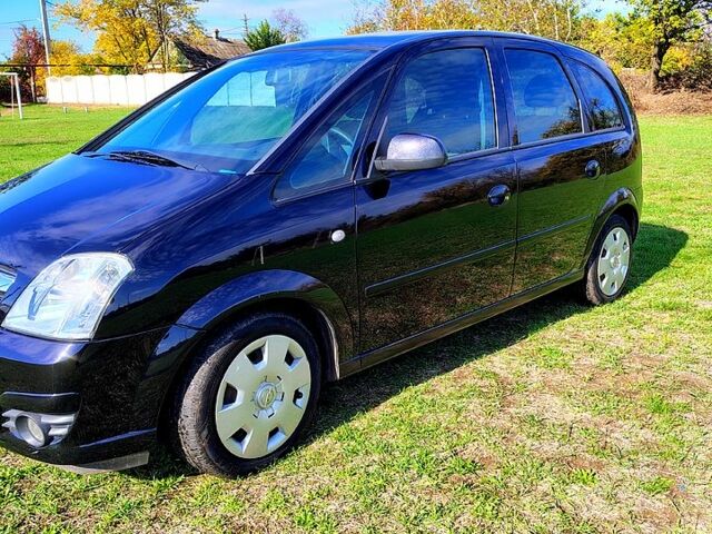 Черный Опель Мерива, объемом двигателя 1.4 л и пробегом 184 тыс. км за 5000 $, фото 1 на Automoto.ua