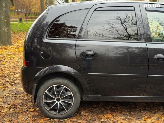 Черный Опель Мерива, объемом двигателя 1.6 л и пробегом 262 тыс. км за 4740 $, фото 7 на Automoto.ua