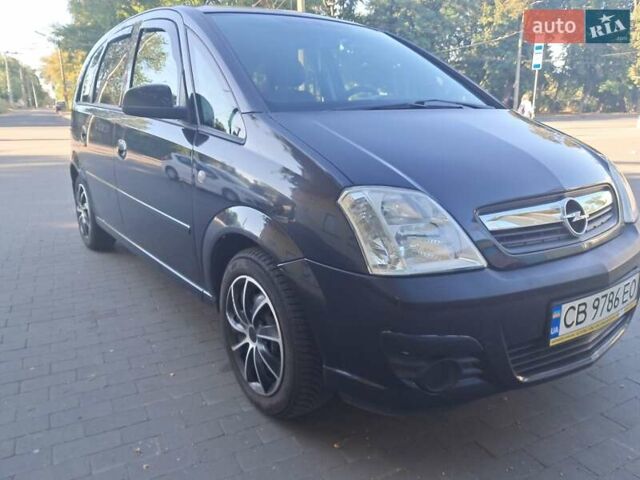 Черный Опель Мерива, объемом двигателя 1.6 л и пробегом 262 тыс. км за 4100 $, фото 1 на Automoto.ua