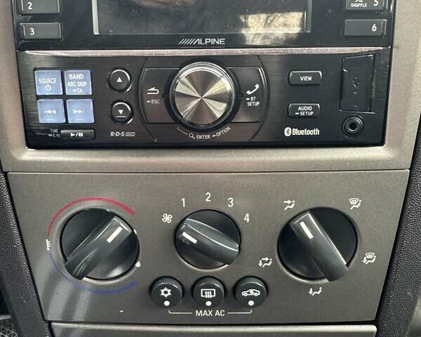 Черный Опель Мерива, объемом двигателя 1.6 л и пробегом 149 тыс. км за 4150 $, фото 12 на Automoto.ua