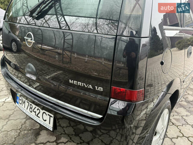 Черный Опель Мерива, объемом двигателя 1.6 л и пробегом 175 тыс. км за 4250 $, фото 9 на Automoto.ua