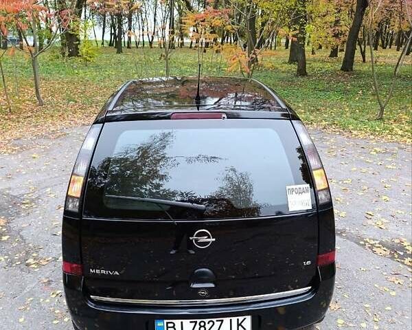 Черный Опель Мерива, объемом двигателя 1.6 л и пробегом 150 тыс. км за 5400 $, фото 4 на Automoto.ua