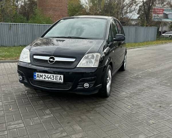 Черный Опель Мерива, объемом двигателя 1.6 л и пробегом 149 тыс. км за 4500 $, фото 1 на Automoto.ua