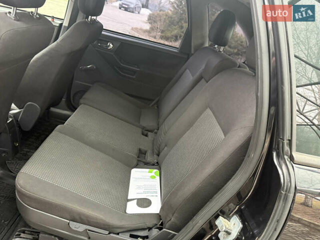 Черный Опель Мерива, объемом двигателя 1.6 л и пробегом 175 тыс. км за 4250 $, фото 29 на Automoto.ua