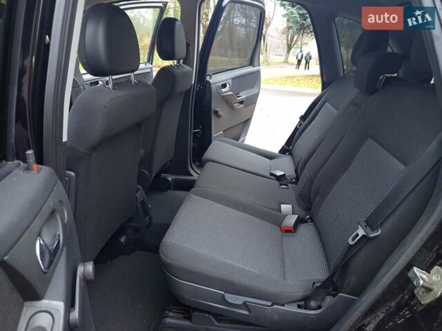 Черный Опель Мерива, объемом двигателя 1.6 л и пробегом 177 тыс. км за 4899 $, фото 28 на Automoto.ua
