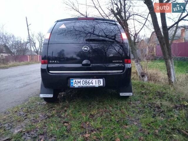 Черный Опель Мерива, объемом двигателя 1.6 л и пробегом 145 тыс. км за 3850 $, фото 11 на Automoto.ua