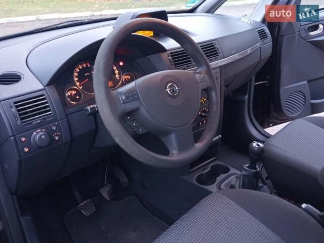Черный Опель Мерива, объемом двигателя 1.6 л и пробегом 177 тыс. км за 4899 $, фото 12 на Automoto.ua