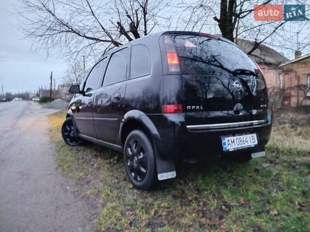 Черный Опель Мерива, объемом двигателя 1.6 л и пробегом 145 тыс. км за 3850 $, фото 12 на Automoto.ua