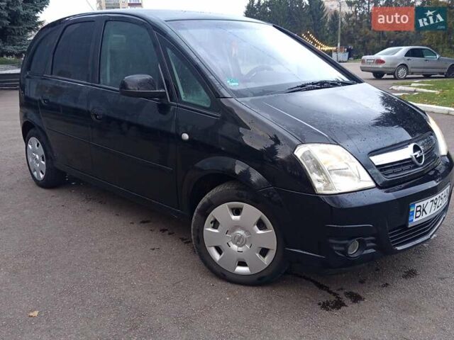 Черный Опель Мерива, объемом двигателя 1.6 л и пробегом 177 тыс. км за 4899 $, фото 11 на Automoto.ua