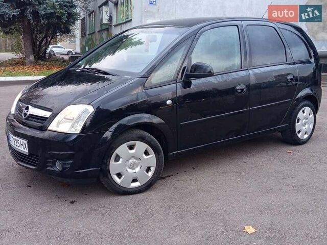 Черный Опель Мерива, объемом двигателя 1.6 л и пробегом 177 тыс. км за 4899 $, фото 1 на Automoto.ua