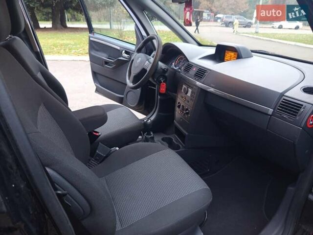 Черный Опель Мерива, объемом двигателя 1.6 л и пробегом 177 тыс. км за 4899 $, фото 31 на Automoto.ua