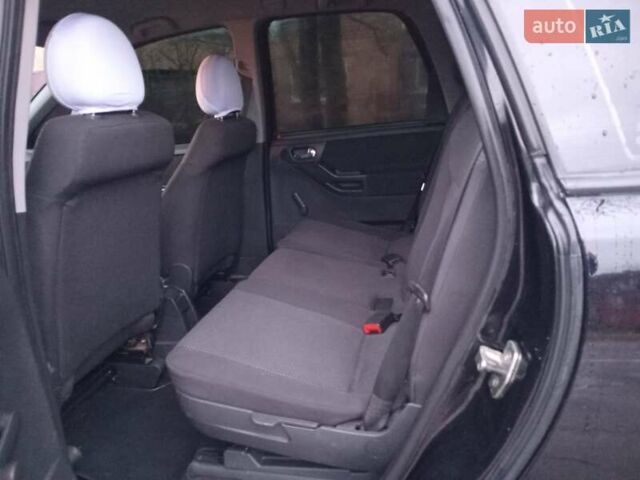 Черный Опель Мерива, объемом двигателя 1.6 л и пробегом 145 тыс. км за 3850 $, фото 17 на Automoto.ua