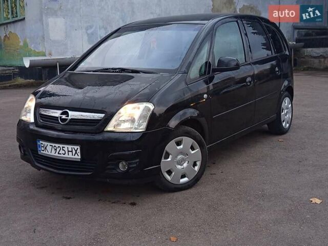 Черный Опель Мерива, объемом двигателя 1.6 л и пробегом 177 тыс. км за 4899 $, фото 4 на Automoto.ua