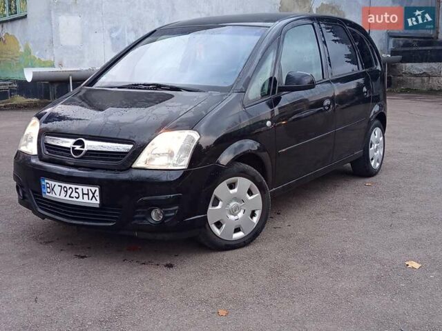Черный Опель Мерива, объемом двигателя 1.6 л и пробегом 177 тыс. км за 4899 $, фото 3 на Automoto.ua