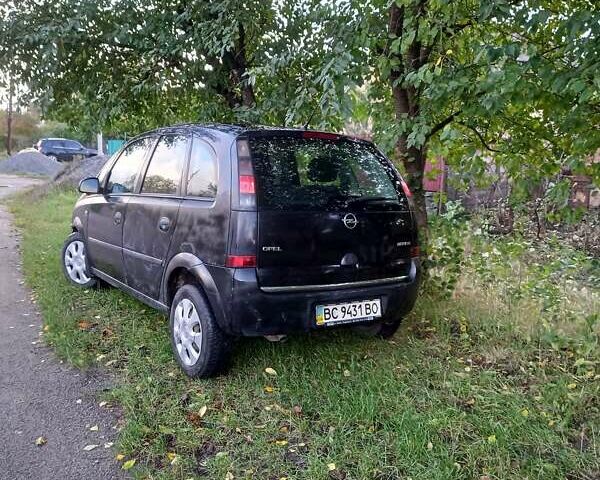 Черный Опель Мерива, объемом двигателя 1.6 л и пробегом 145 тыс. км за 2350 $, фото 16 на Automoto.ua