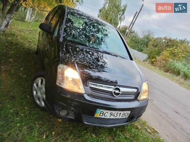 Черный Опель Мерива, объемом двигателя 1.6 л и пробегом 145 тыс. км за 2350 $, фото 1 на Automoto.ua