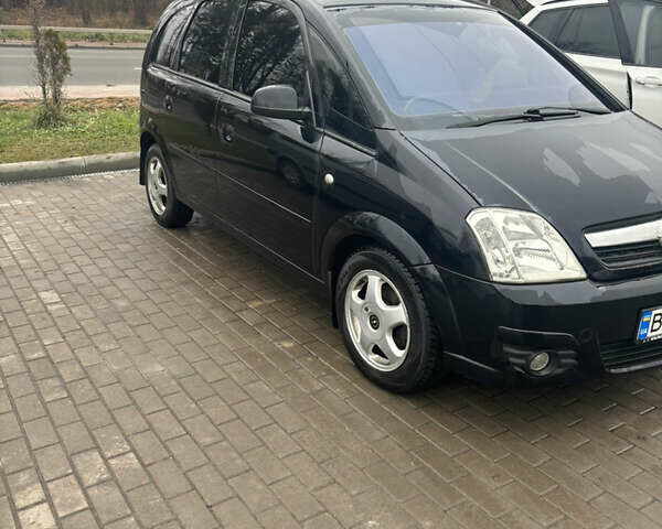 Черный Опель Мерива, объемом двигателя 1.6 л и пробегом 158 тыс. км за 4500 $, фото 6 на Automoto.ua