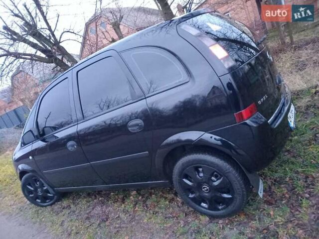 Черный Опель Мерива, объемом двигателя 1.6 л и пробегом 145 тыс. км за 3850 $, фото 9 на Automoto.ua
