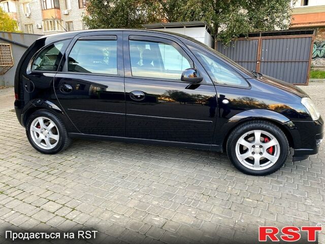 Чорний Опель Меріва, об'ємом двигуна 1.8 л та пробігом 260 тис. км за 5800 $, фото 6 на Automoto.ua