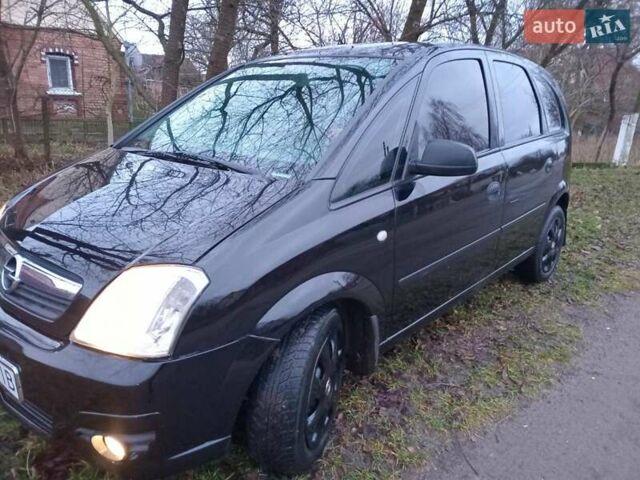 Черный Опель Мерива, объемом двигателя 1.6 л и пробегом 145 тыс. км за 3850 $, фото 8 на Automoto.ua