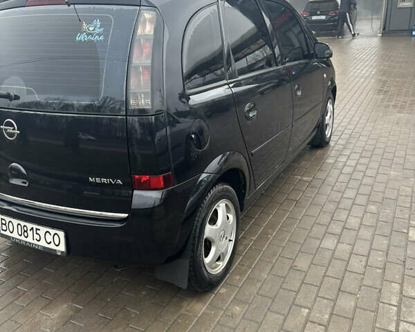 Черный Опель Мерива, объемом двигателя 1.6 л и пробегом 158 тыс. км за 4500 $, фото 3 на Automoto.ua